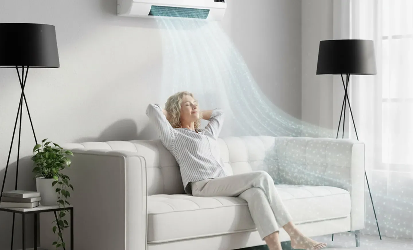 Person relaxing under wall-mounted CoolCove